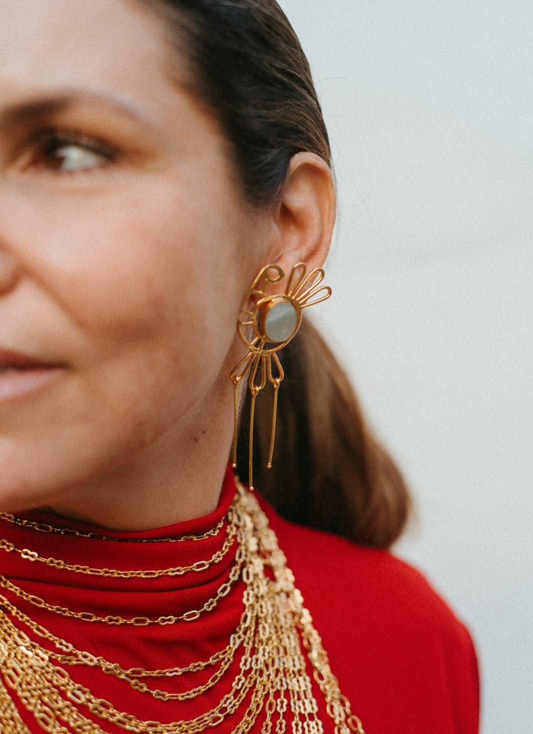 THE MOTHER-OF-PEARL ROOSTER EARRINGS.