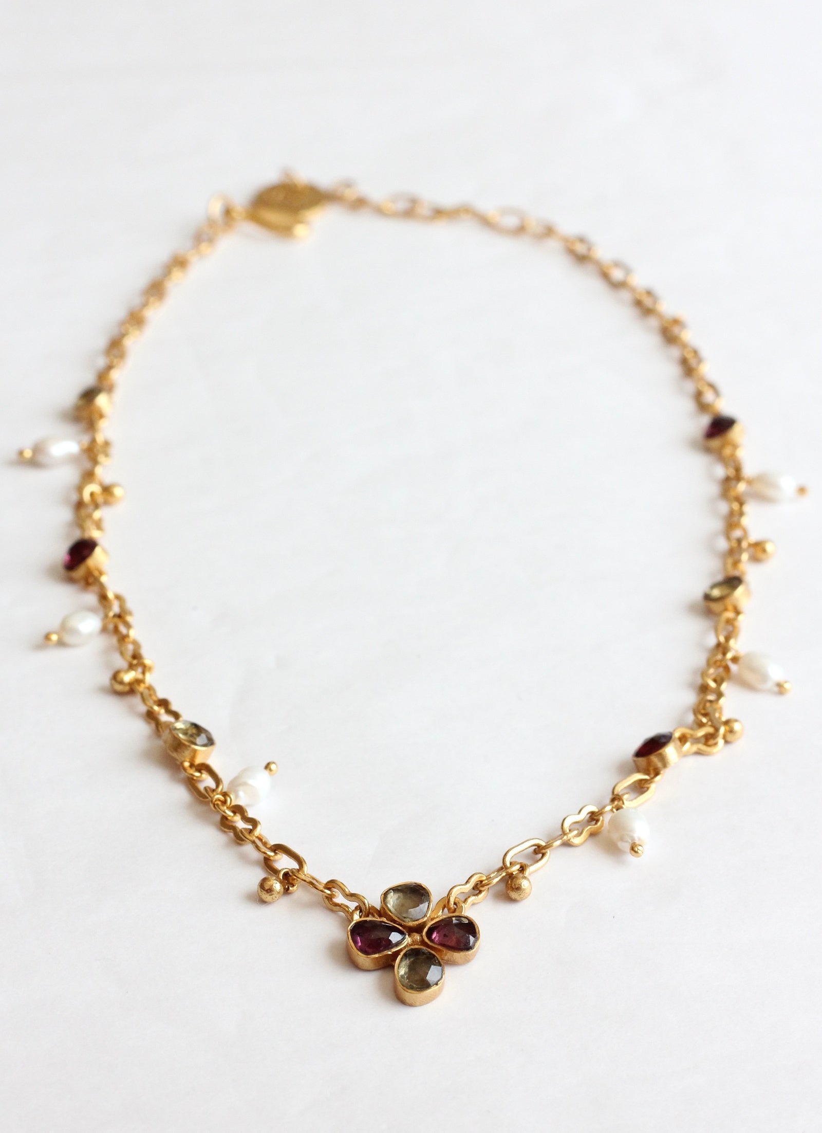 FRANGIPANI GARNET NECKLACE