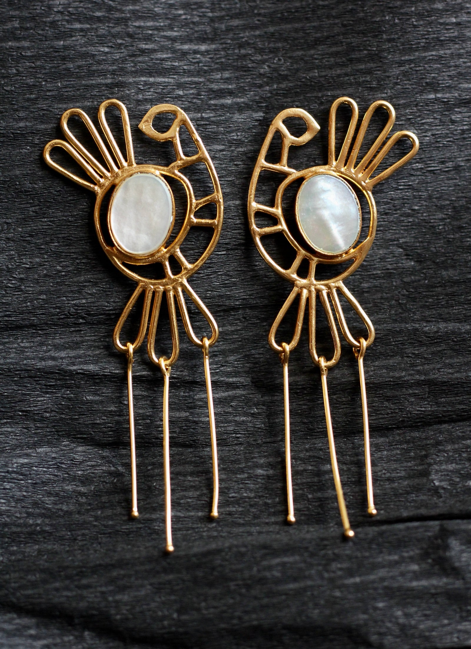 THE MOTHER-OF-PEARL ROOSTER EARRINGS.